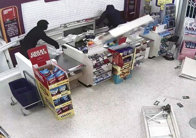 CCTV of shop thieves in action